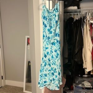 Blue long summer dress with a tie